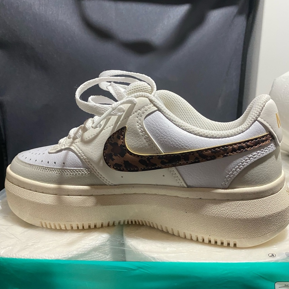 Nike sneakers never worn 7.5 white with leopard swish